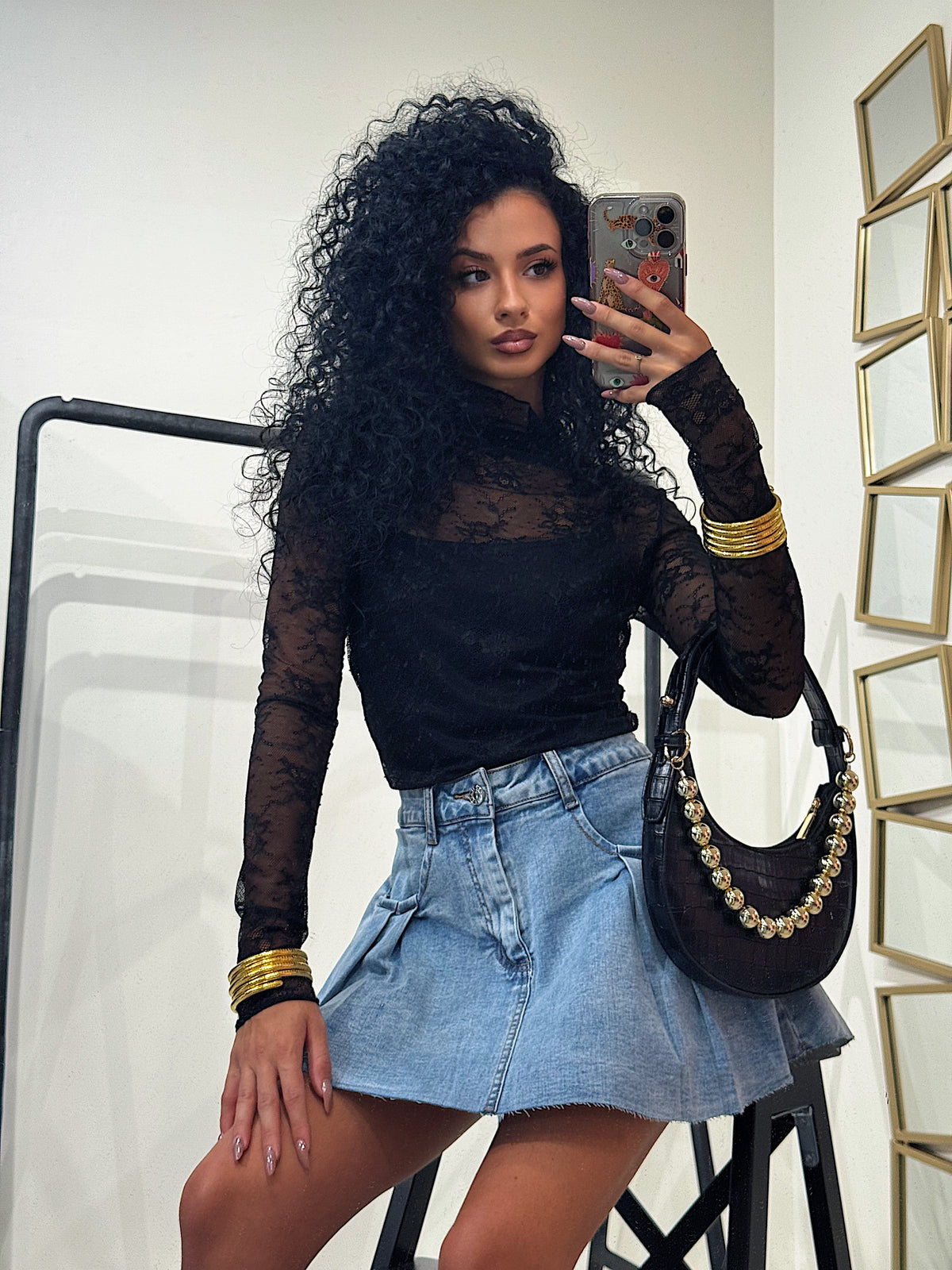 Maglia in pizzo collo alto