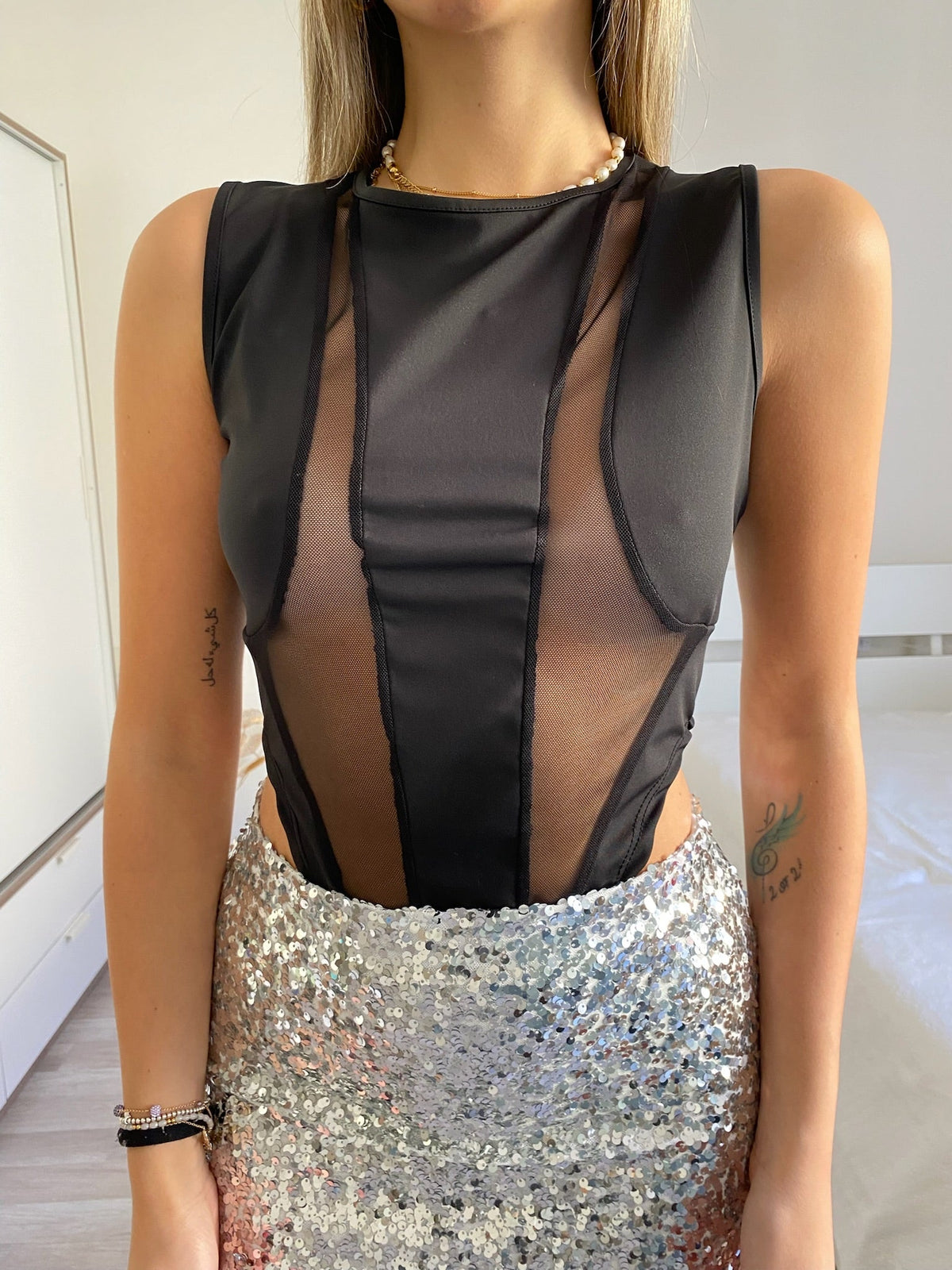 Body nero con trasparenze