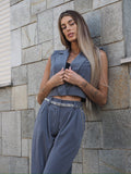Completo smanicato e pantalone grigio