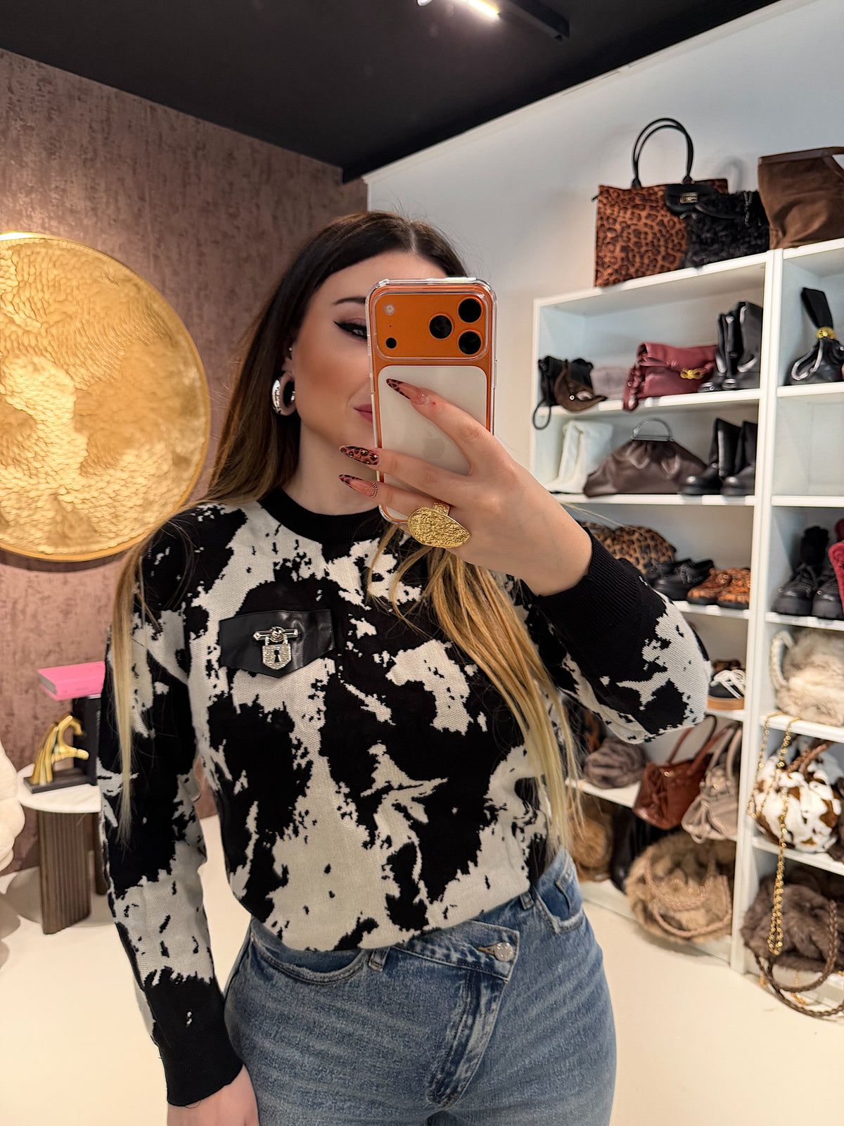 Felpa Cow print con lucchetto