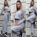 Completo maglia e pantalone grigio a righe