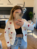 Cardigan bianco cuori rossi