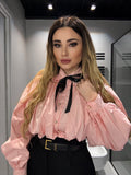Camicia rosa con fiocco