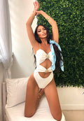 Costume intero con sole bianco