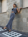 Completo smanicato e pantalone grigio