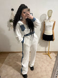 Tuta sportiva in denim