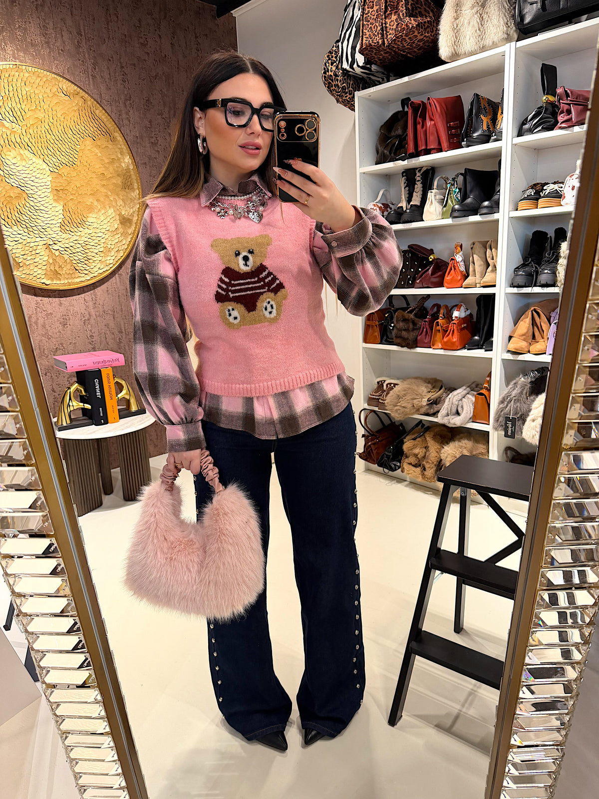 Jeans con borchie laterali