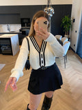 Maglione/ cardigan bianco nero con bottoni