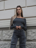 Maglione grigio con scollo a barchetta