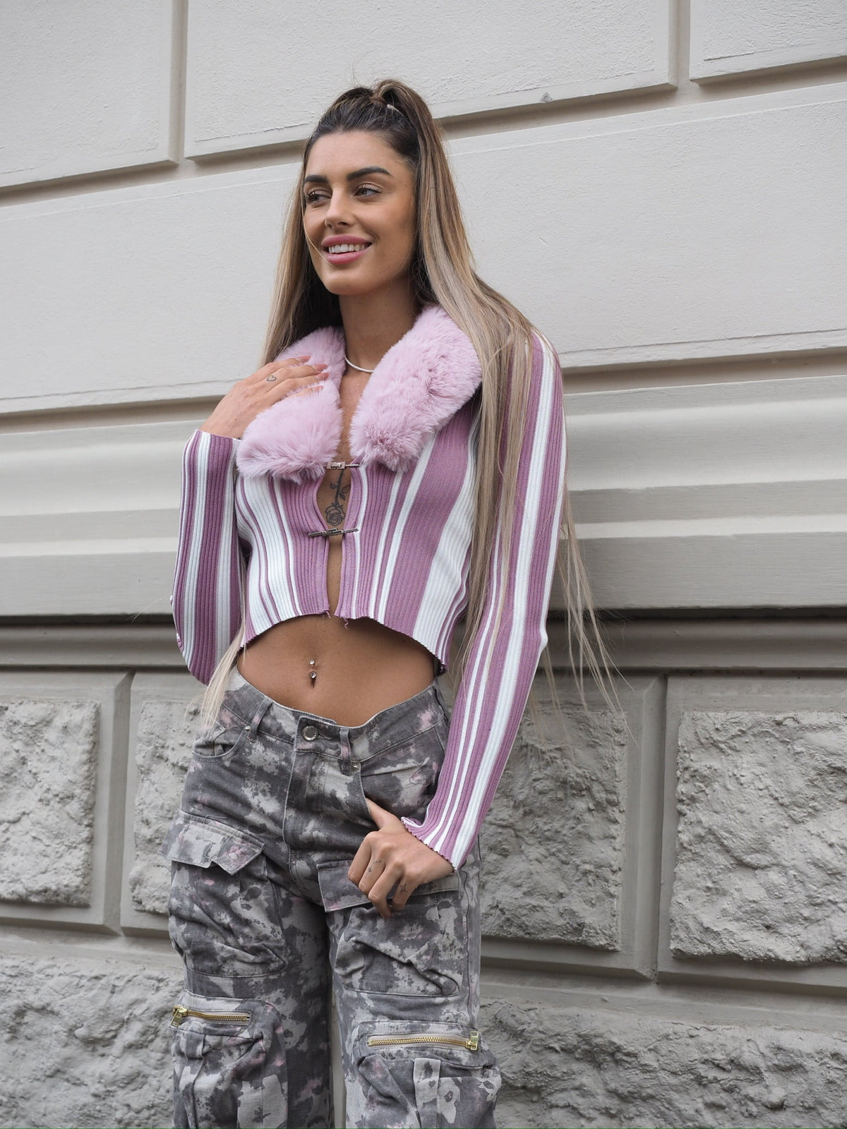 Maglione con pelliccia rosa