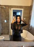 Abito nero con trasparenze