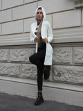 Cardigan bianco a trecce