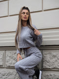Completo maglia e pantalone grigio a righe
