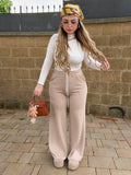Pantalone beige con banda bianca