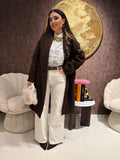 Cappotto con fodera animalier e spille