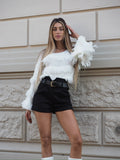 Maglione bianco con frange