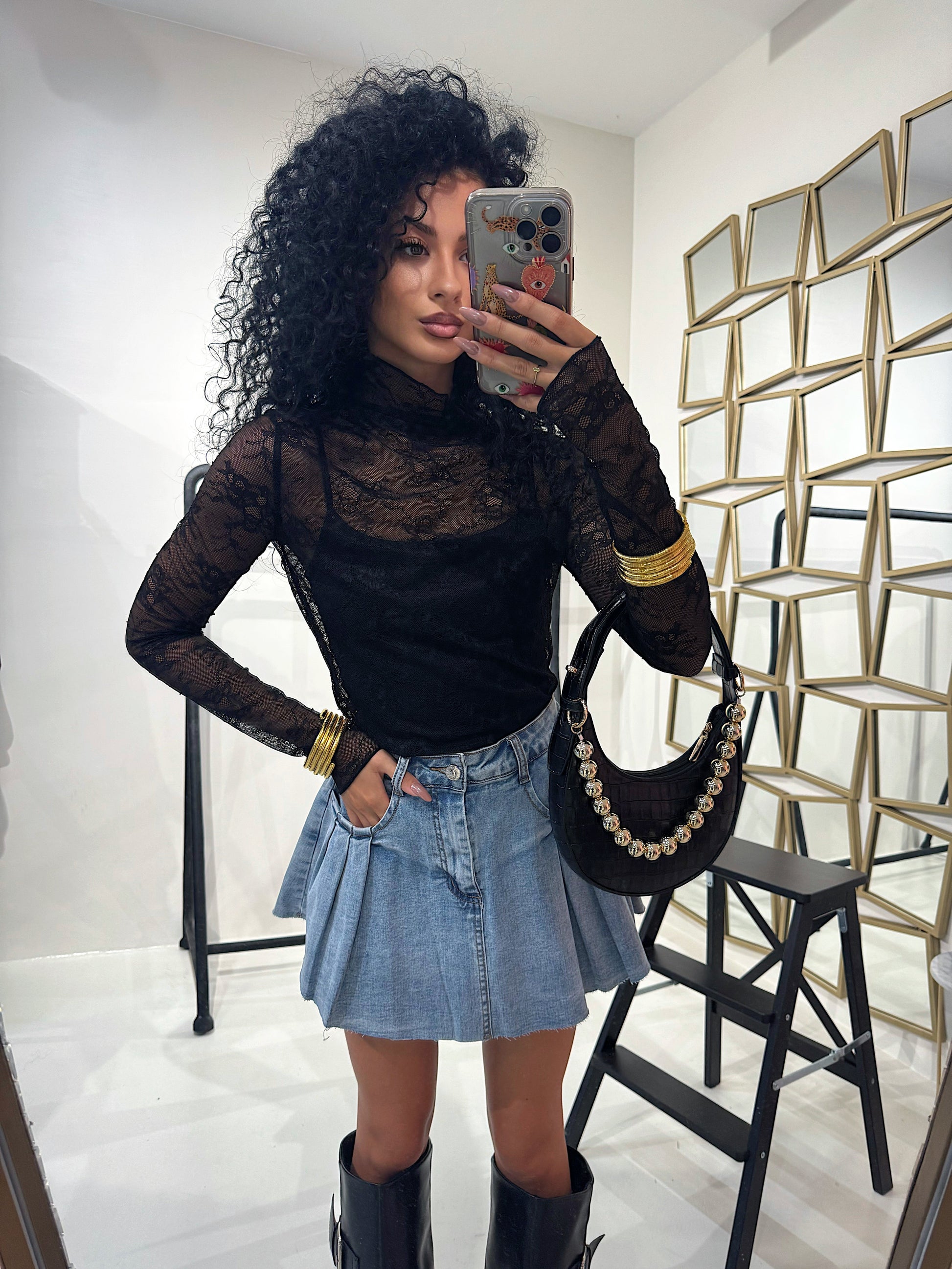 Maglia in pizzo collo alto
