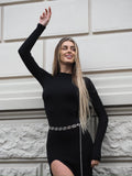 Abito nero a costine con spacco