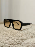 Occhiale nero con lente chiara