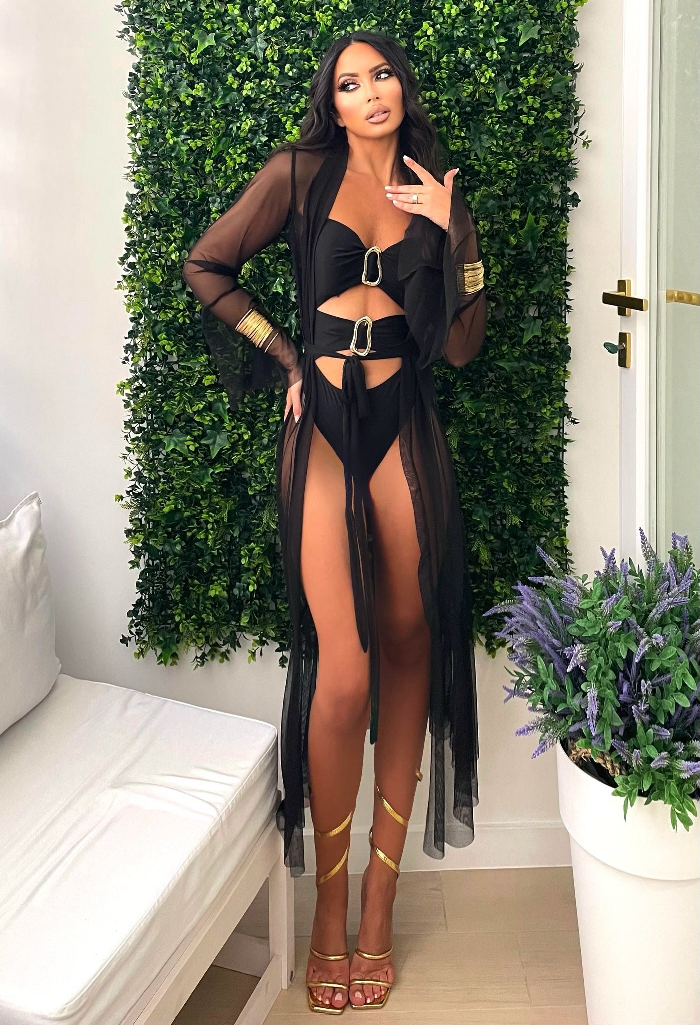 Costume intero con gioiello sul davanti nero