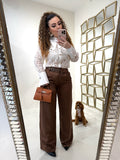 Pantalone con fibbia laterale