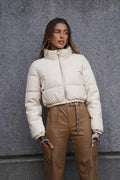 Piumino bomber beige