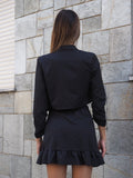 Completo giacca e gonna gessato nero