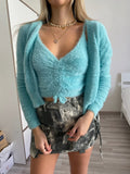 Due pezzi Cardigan e top