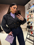 Trench con elastico