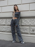 Maglione grigio con scollo a barchetta