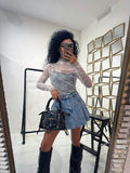 Maglia in pizzo collo alto