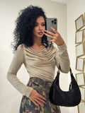 Maglia a maniche lunghe con scollo drappeggiato