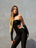 Tuta nera con fori e choker