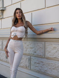Completo top e pantalone con strass burro