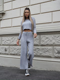 Completo maglia e pantalone grigio a righe