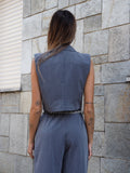 Completo smanicato e pantalone grigio