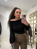 Maglia a maniche lunghe con scollo drappeggiato
