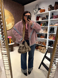 Giacca in ecopelliccia e jeans