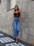 Jeans cargo con tasconi