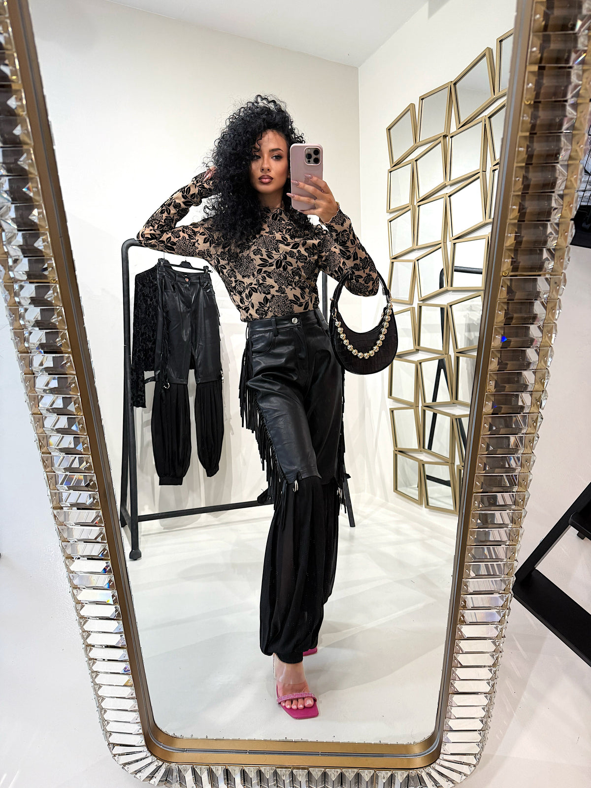Pantalone in ecopelle con frange