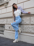 Jeans chiaro con strappi