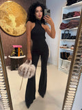 Tuta choker schiena aperta nero