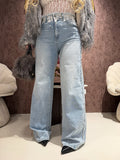 Jeans con pizzo e perle