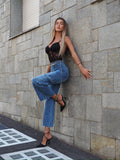 Jeans cargo con tasconi