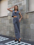 Completo smanicato e pantalone grigio