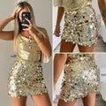 Gonna con maxi paillettes oro