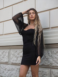Abito nero maniche velate