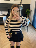 Maglioncino a trecce nude e nero
