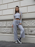 Completo maglia e pantalone grigio a righe