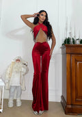 Tuta rossa con incrocio e frange in strass